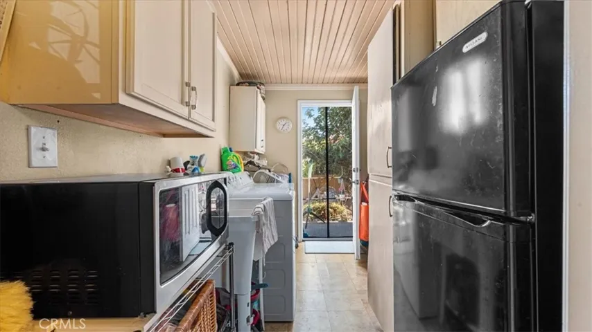 LAUNDRY ROOM AREA/STORAGE TO 2ND UNIT