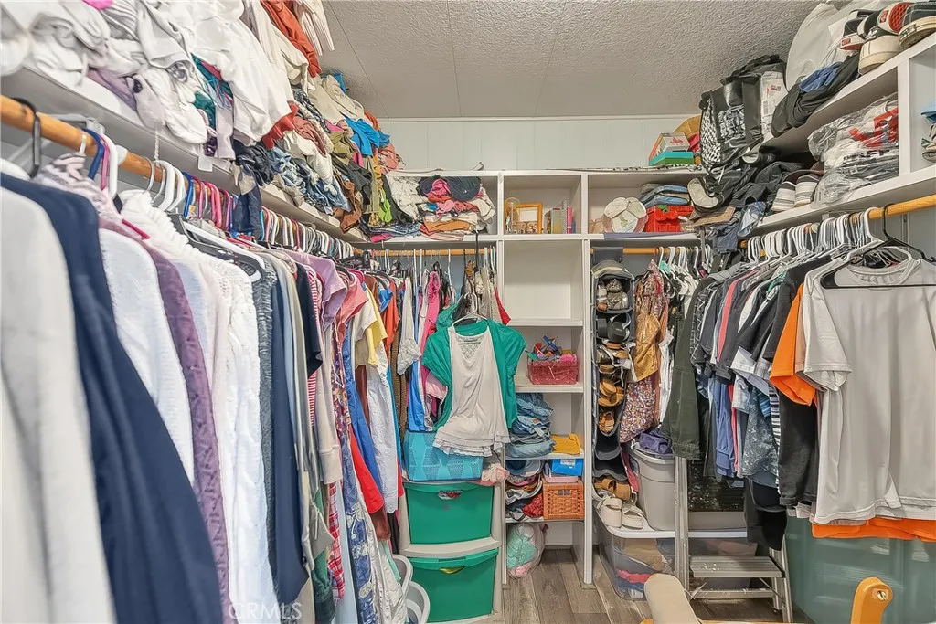 PRIMARY WALK IN CLOSET PRIMARY WALK IN CLOSET