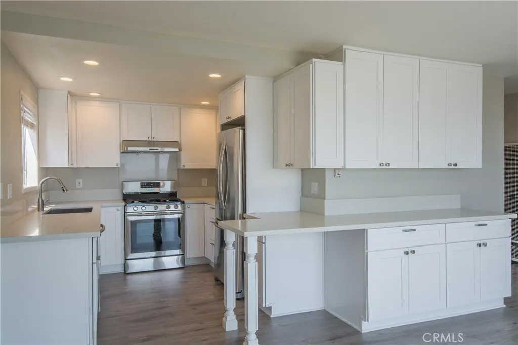 Kitchen with stainless appliances and gas stove