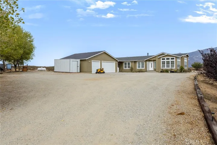 Front of property - Home w/approx. 1,020 SF Detached Garage