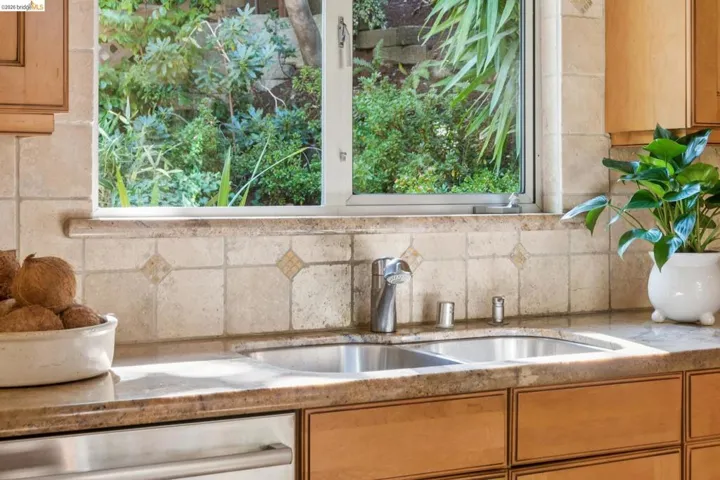 Double basin stainless steel sink with a chrome faucet