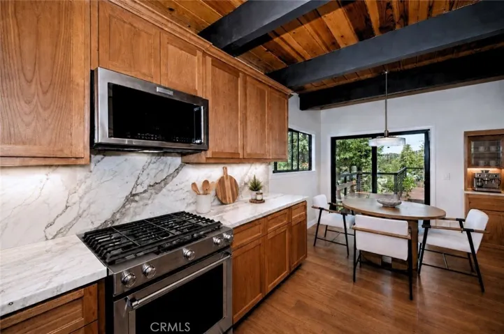 Kitchen & Dining area
Virtually staged (Countertop, coffee machine, and decor)