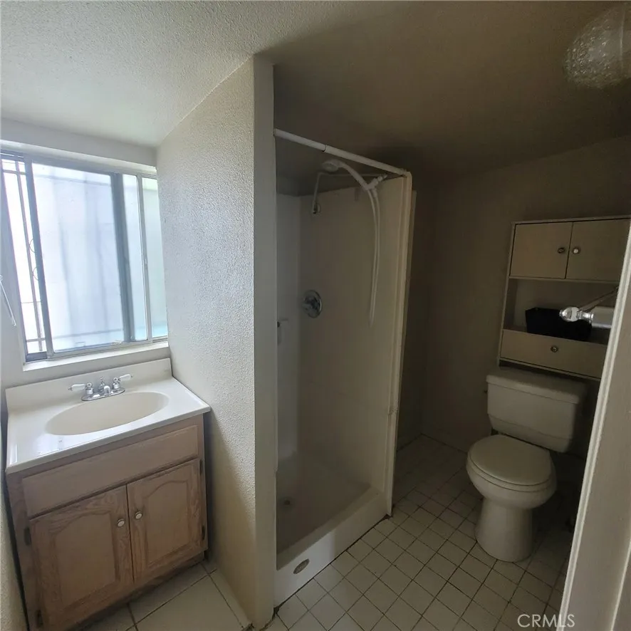 Back Unit Bathroom (Prior to Tenant Occupancy)