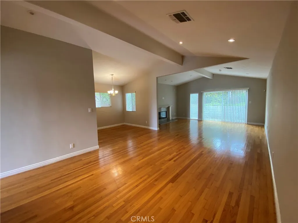 High ceiling living rm and family rm to enc. backyard