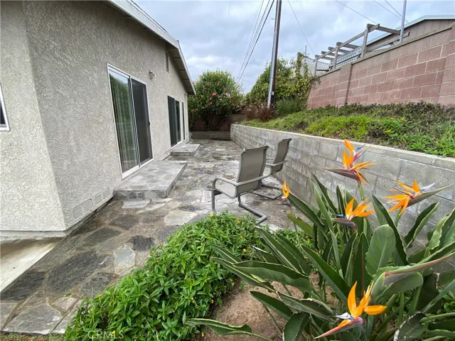 stone covered private back yd & side yd.