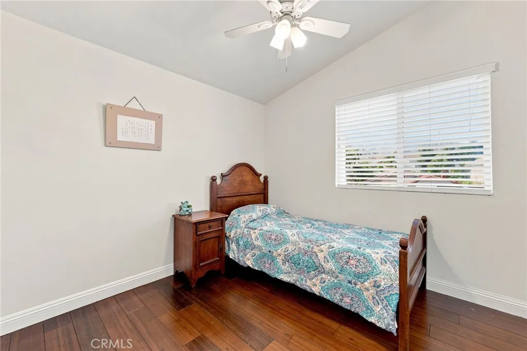The secondary bedrooms also feature volume ceilings and ceiling fans. The secondary bedrooms also feature volume ceilings and ceiling fans.