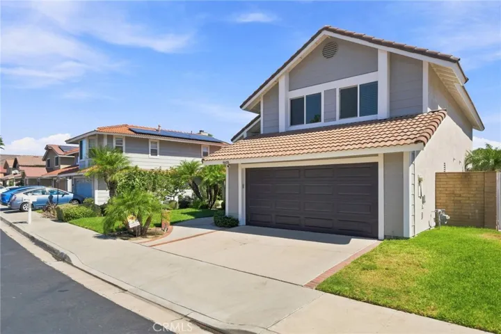Two car attached garage with direct access.  Larger driveway with room to park two cars.