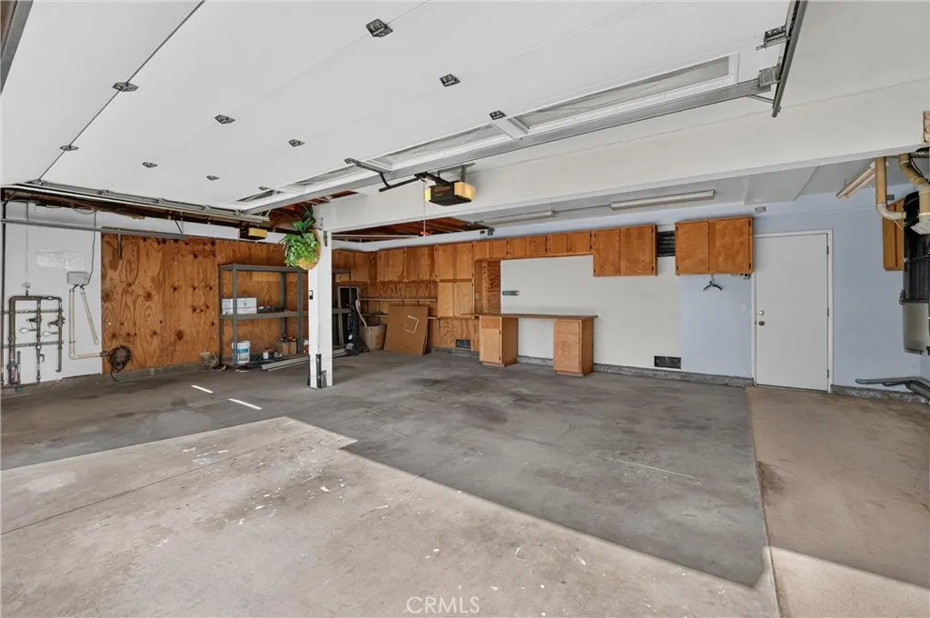 3 Car Garage with cabinets