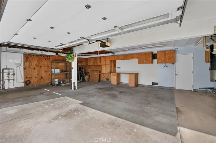 3 Car Garage with cabinets