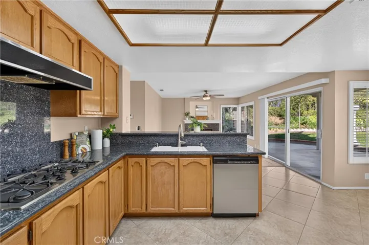 Natural light fills the room while drawing your eye to the beautiful backyard and peaceful views.