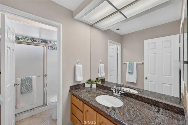 Downstairs Bathroom with Shower. Conveniently located next to downstairs beddroom.