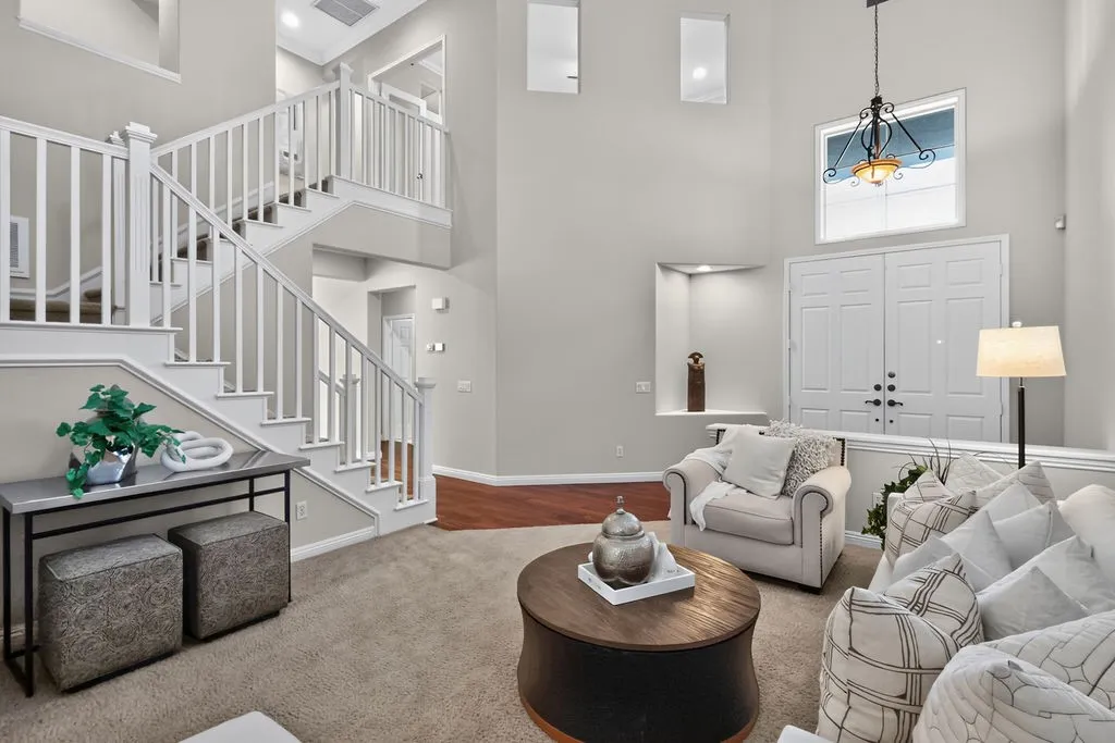 Elegant foyer and stairwell to the second level