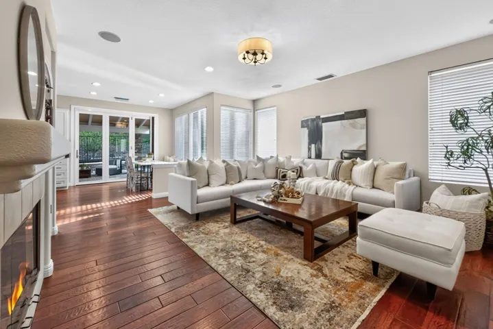 Casual living dining and kitchen sharing the view