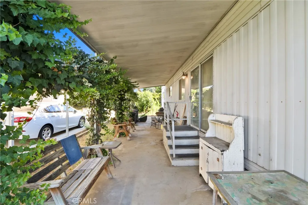 Covered porch almost the entire length of the home.