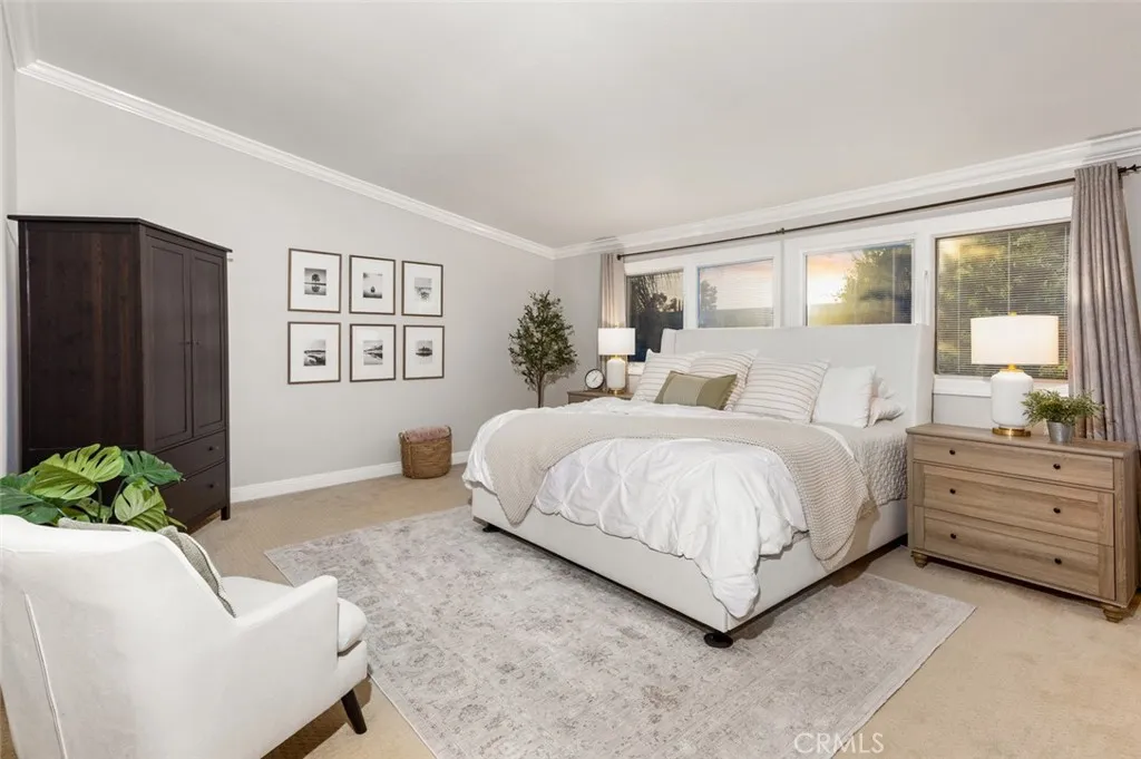 The master bedroom features high ceilings.