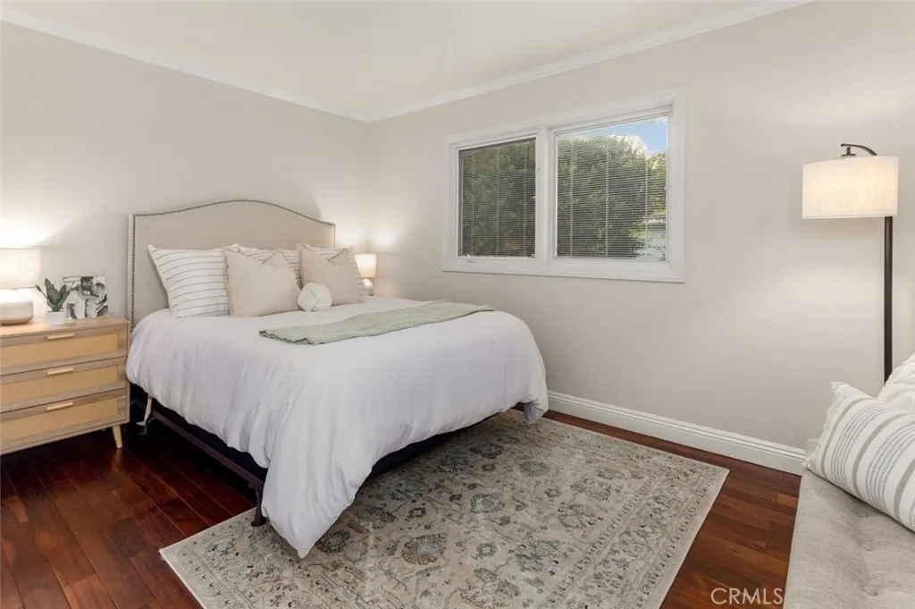 The 4th bedroom, featuring engineered hand-scraped Acacia Hardwood flooring