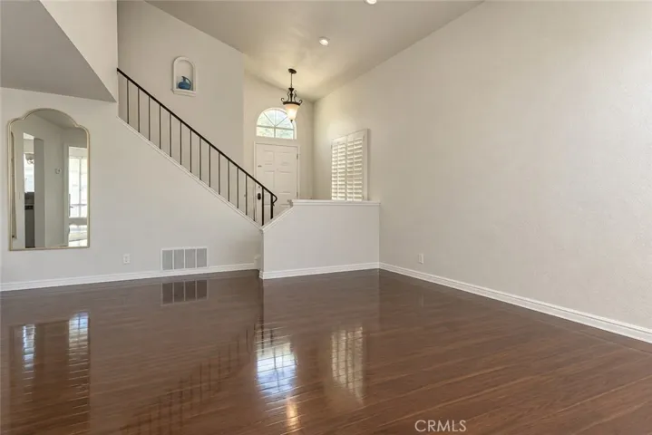 This image has been digitally altered using AI tools to remove furniture and personal clutter only. Structural features and physical condition have not been modified.