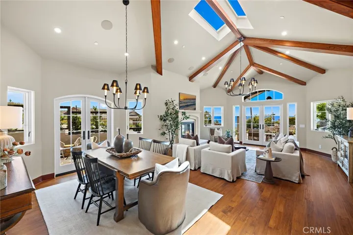 Dining room with another set of french doors leading to another outdoor patio area.