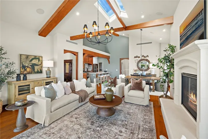 Wonderful open floor plan. Living room looking towards the dining room and kitchen.