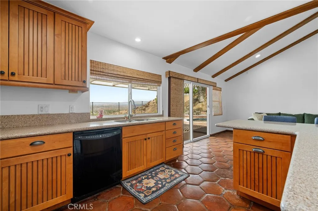 Kitchen opens to the family room Kitchen opens to the family room