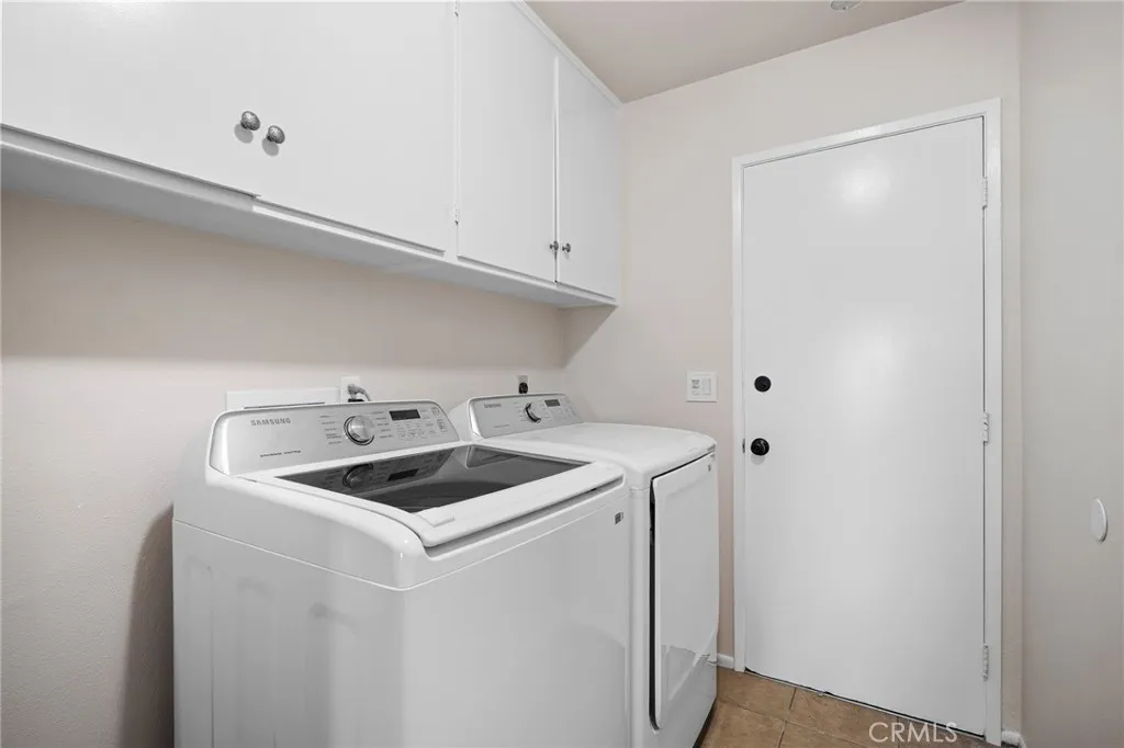 Laundry area. Door to garage Laundry area. Door to garage