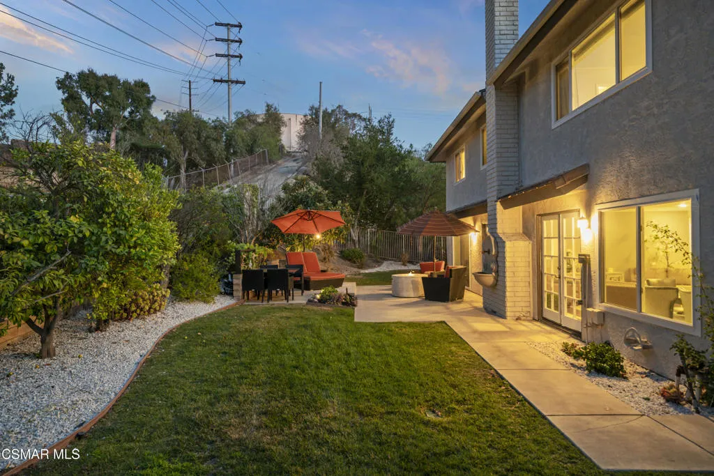 13165-thomasville-ct-twilight-backyard-2 13165-thomasville-ct-twilight-backyard-2