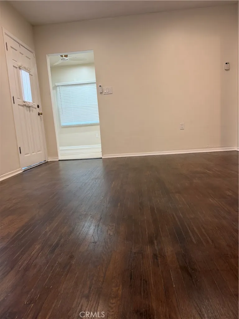 Living room & its hardwood floors. Living room & its hardwood floors.