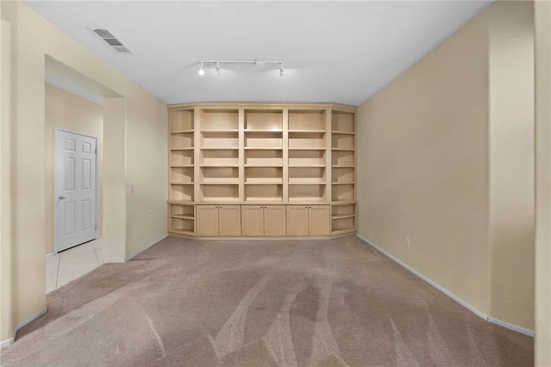 Formal dining with custom shelves Formal dining with custom shelves
