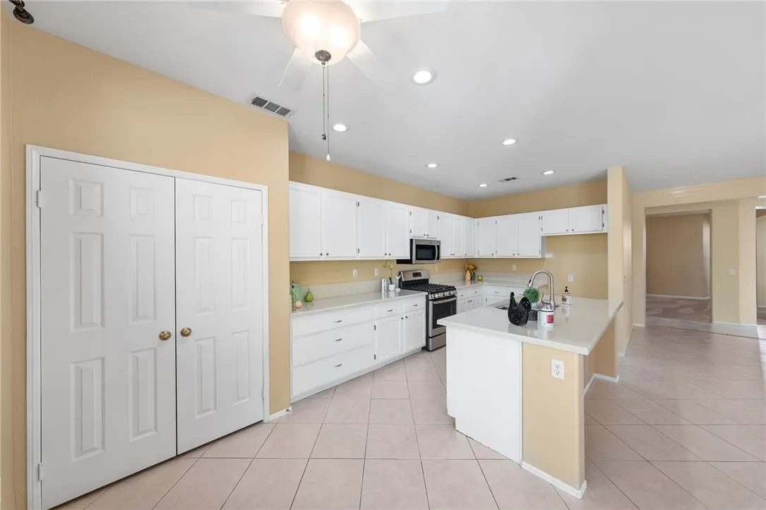 Kitchen has a spacious pantry Kitchen has a spacious pantry