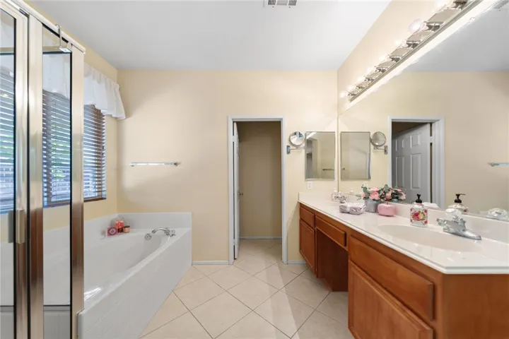 Dual sinks and tub and shower in primary bath