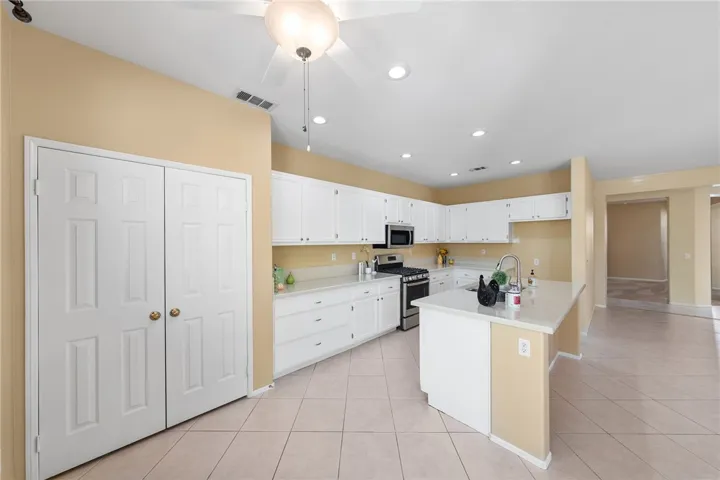 Kitchen has a spacious pantry