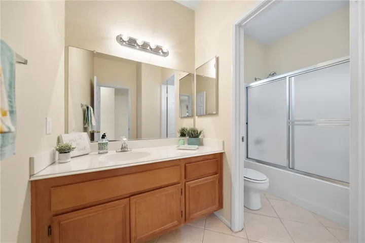 Guest bath #1 with tile floors