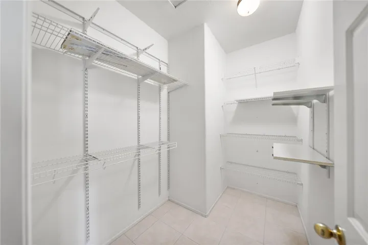 Spacious primary suite walk-in closet