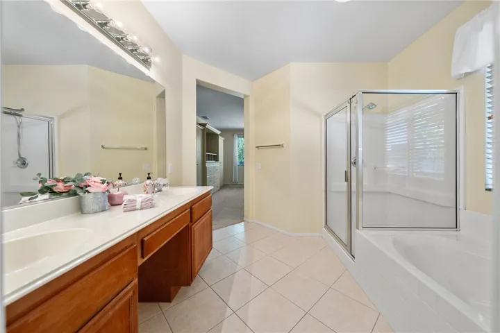 Spacious shower and tub in primary bath