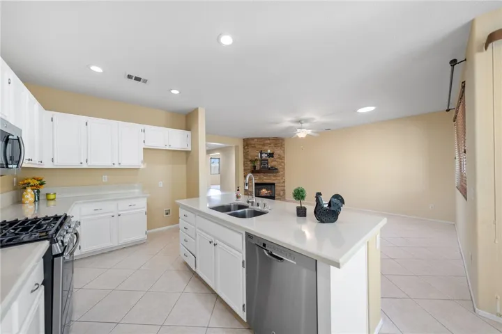 Dishwasher in center island with stainless steel sinks