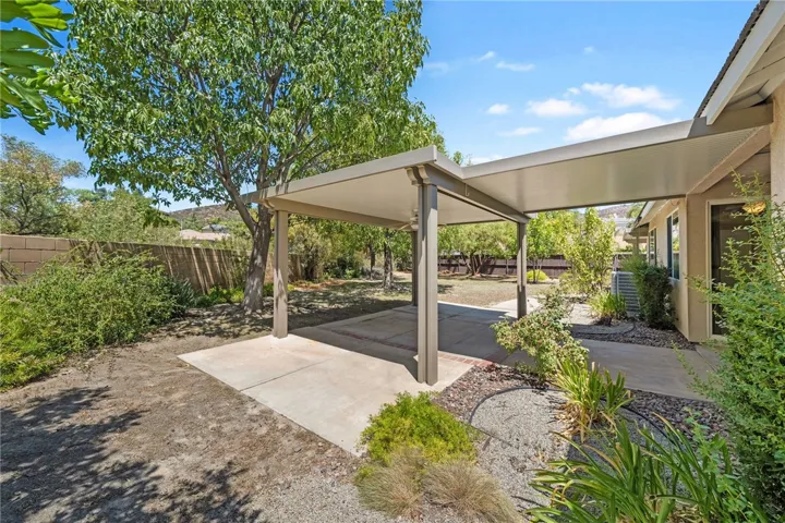 Covered rear patio with ceiling fans