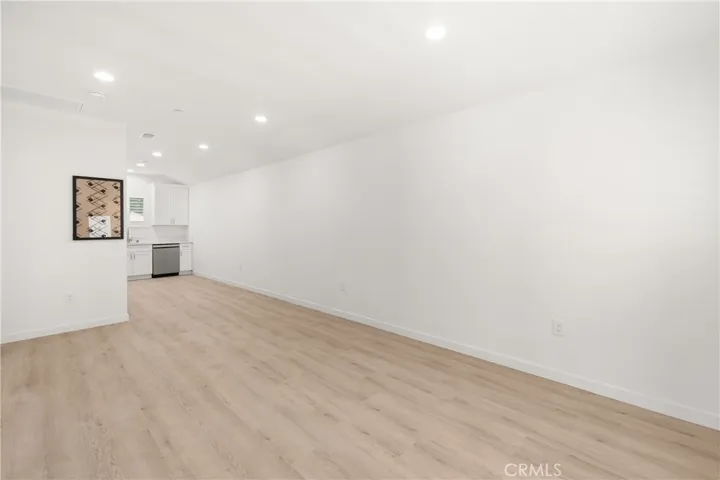 Living Room with high ceilings and recessed lighting