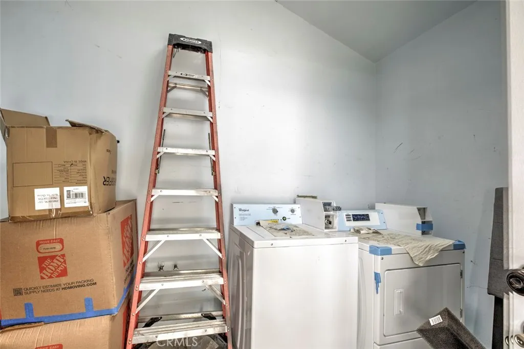 Laundry room with brand new washer & dryer
