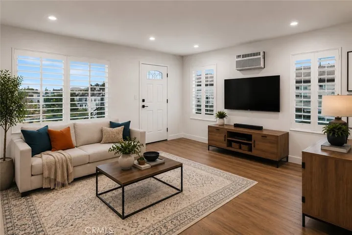 Unit 218 Family Room Photo is virtually staged