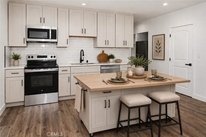 Unit 218 Kitchen and Dining Photo is virtually staged