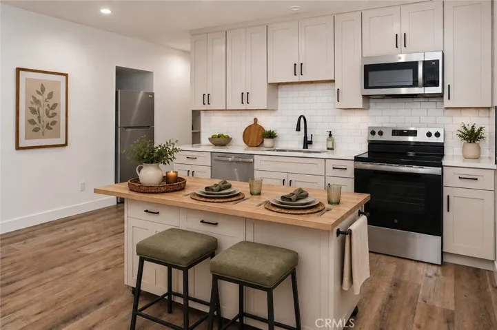 Unit 216 Kitchen and Dining Photo is virtually staged