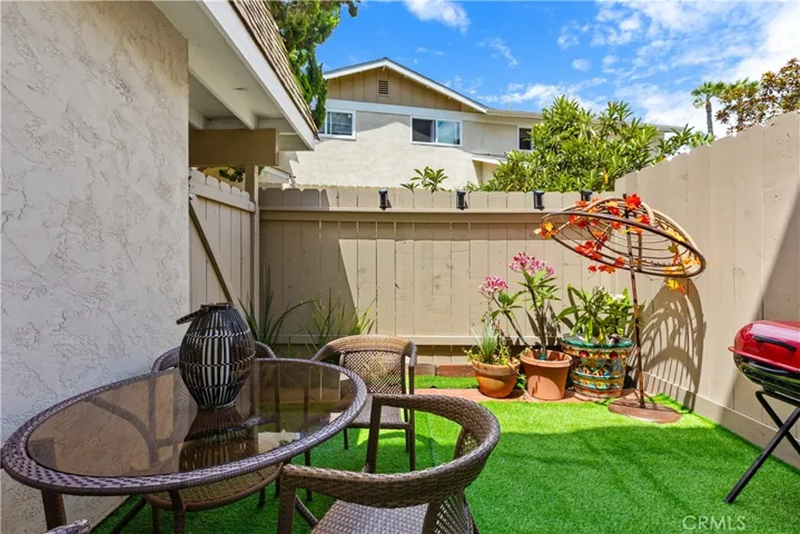 Patio with gate to carport