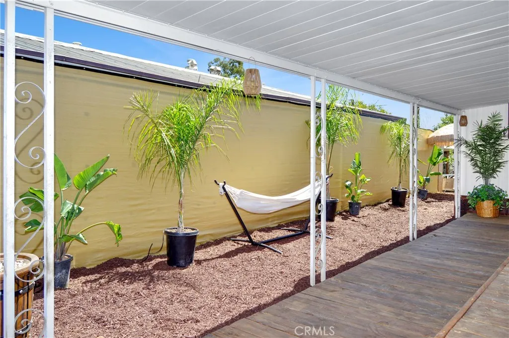 Relax your cares away in the hammock -the potted plants are on a drip system with a timer so no worries here! Relax your cares away in the hammock -the potted plants are on a drip system with a timer so no worries here!