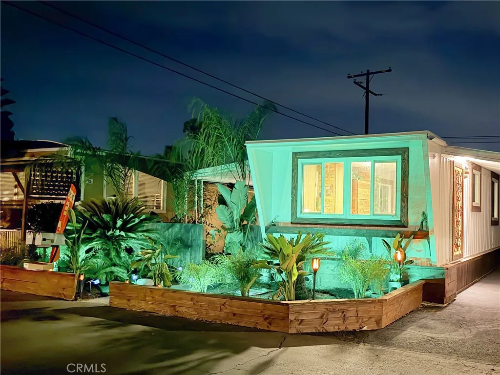 Back to those nighttime photos! Impressive exterior lighting adds to the tropical oasis theme. You can change the color scheme with a remote - fun! Back to those nighttime photos! Impressive exterior lighting adds to the tropical oasis theme. You can change the color scheme with a remote - fun!