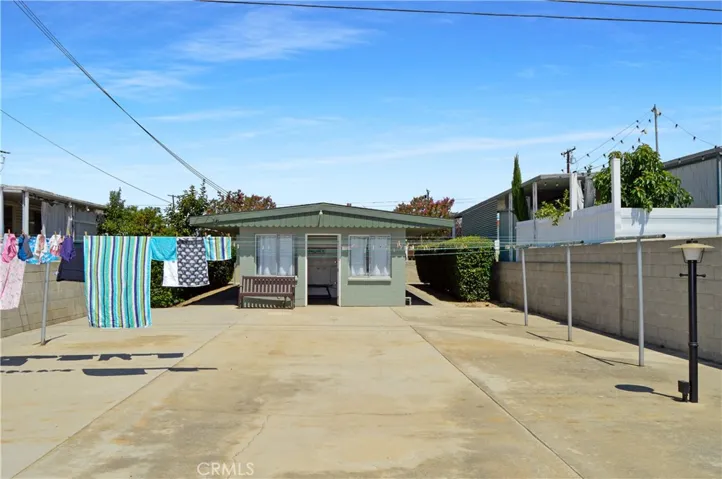 Community Laundry Building with Clotheslines, Washers, and Dryers
