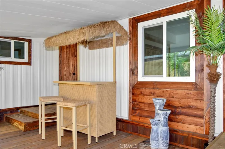 Wood Covered Back Entry Door from the Hall (Left of the Tiki Bar in this Photo)
