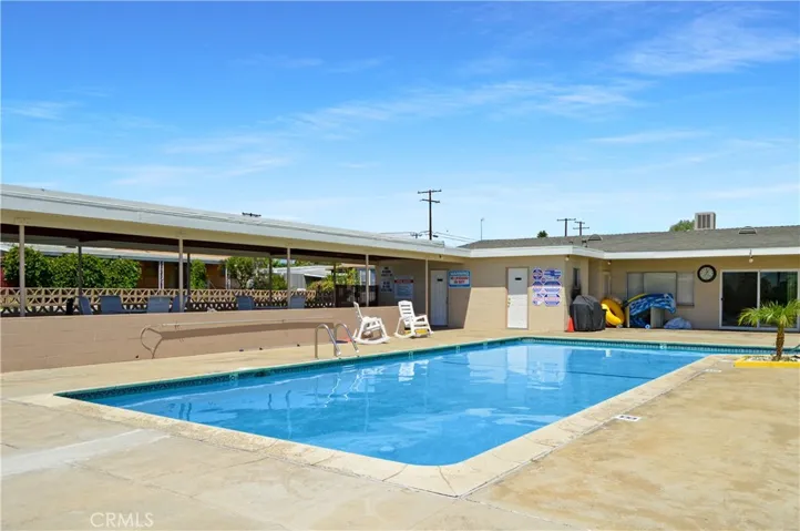 Sparkling Pool with Open Patio, Covered Patio, BBQ, and Lawn Area