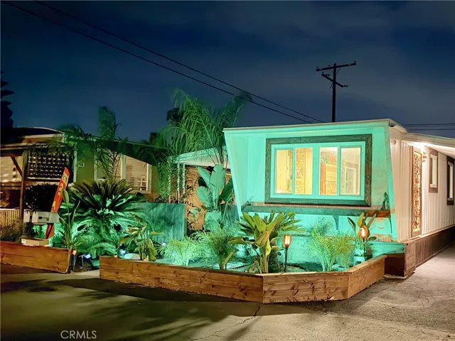 Back to those nighttime photos! Impressive exterior lighting adds to the tropical oasis theme. You can change the color scheme with a remote - fun!