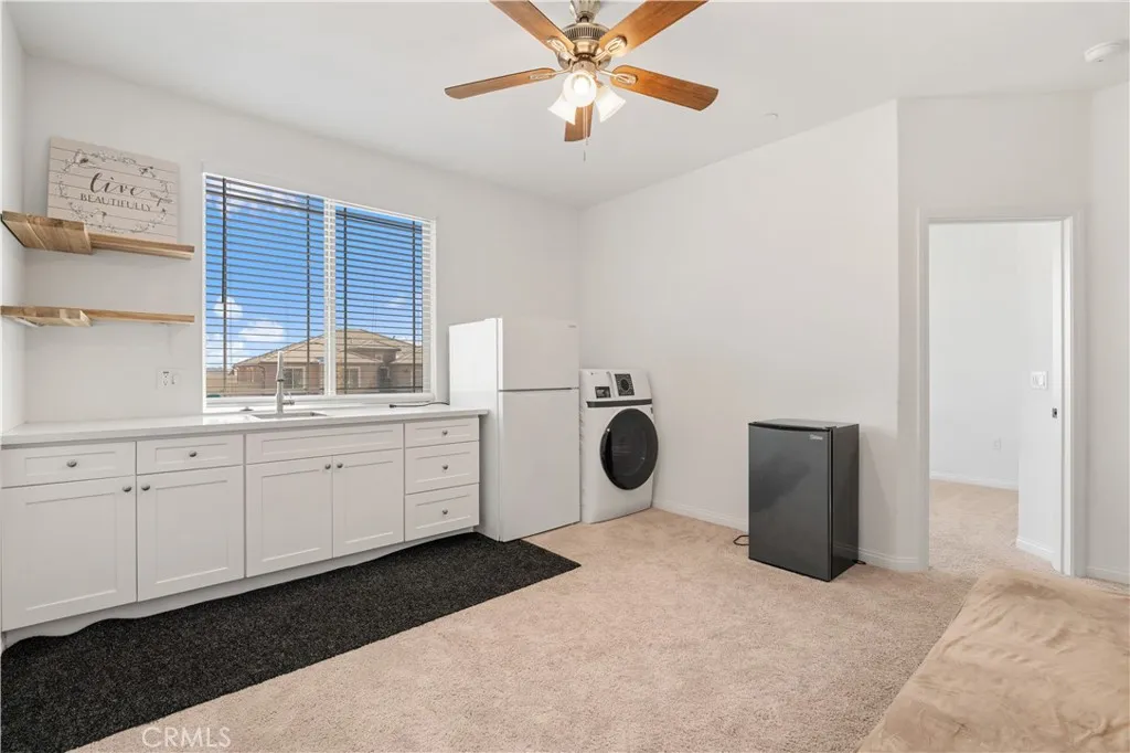 Original photo-Next Gen/ADU room with Kitchenette with Laundry