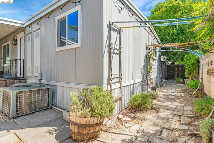 View of home's exterior featuring a central AC unit